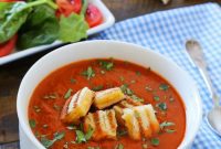 Tomato Basil Soup Crowned with Golden Cheese