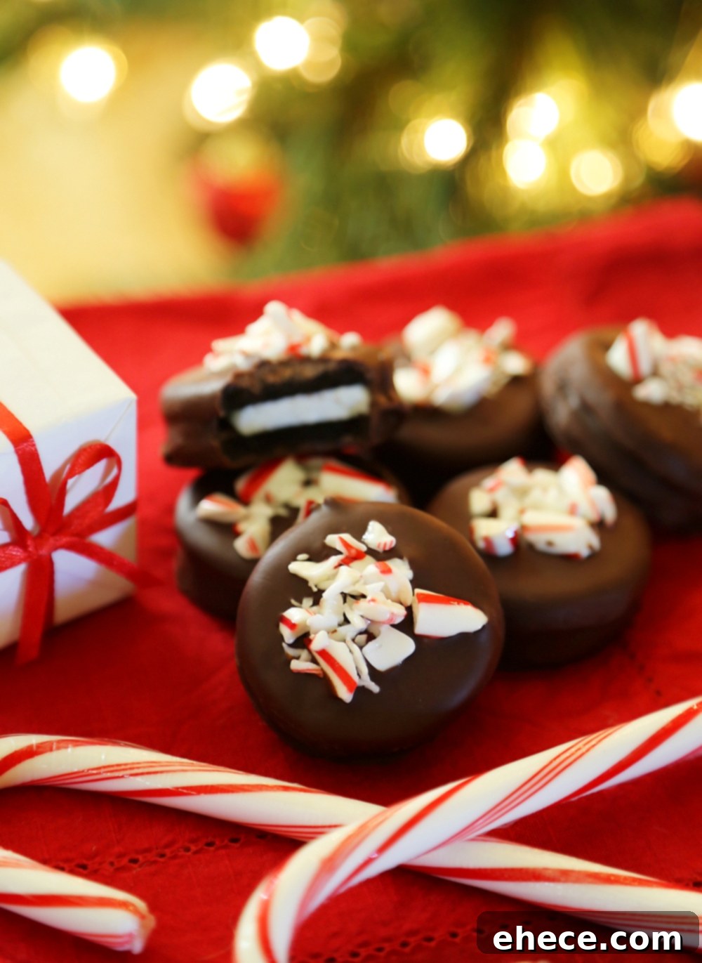 Decadent Peppermint Oreo Delights 4 Close-up of freshly dipped Peppermint Oreos on a baking sheet