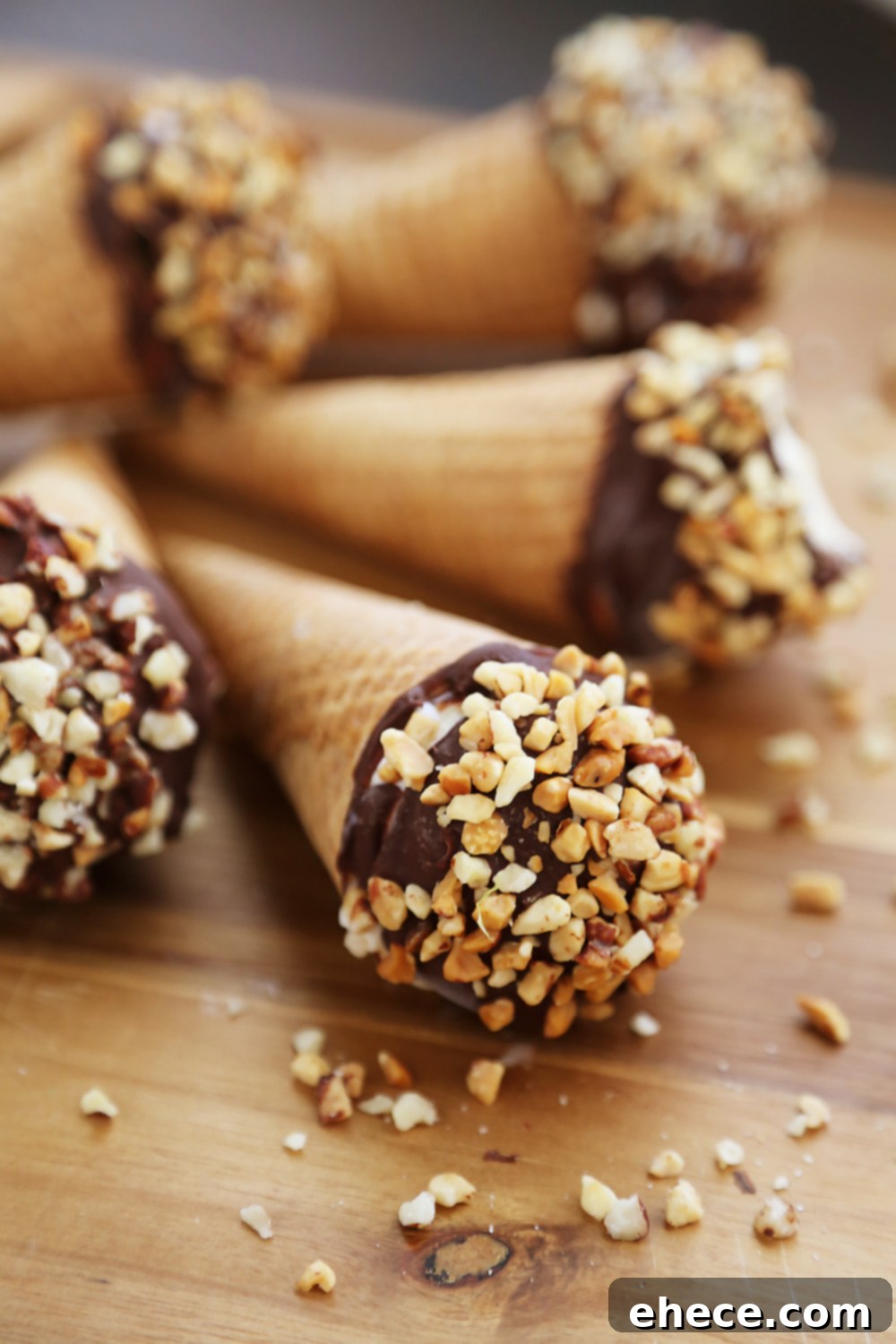 Craft Your Own Chocolate Shell Cones 4 Homemade Vanilla Drumstick Ice Cream Cones – Everyone's favorite frozen treat made at home! These creamy, crisp ice cream cones taste 100x better than store bought. Thecomfortofcooking.com