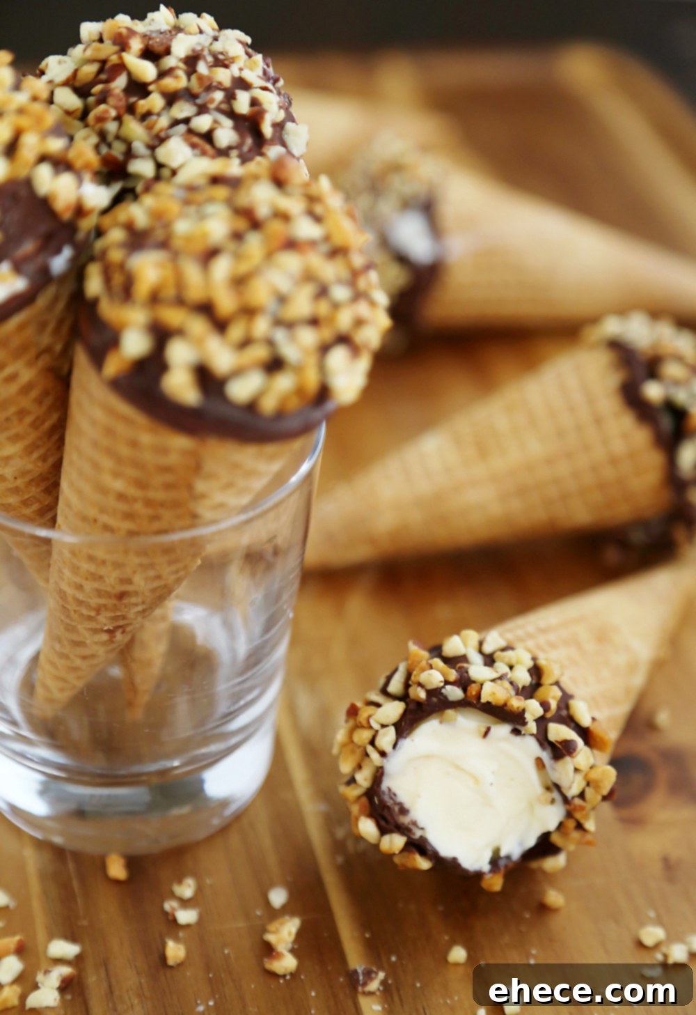 Craft Your Own Chocolate Shell Cones 7 Homemade Vanilla Drumstick Ice Cream Cones – Everyone's favorite frozen treat made at home! These creamy, crisp ice cream cones taste 100x better than store bought. Thecomfortofcooking.com