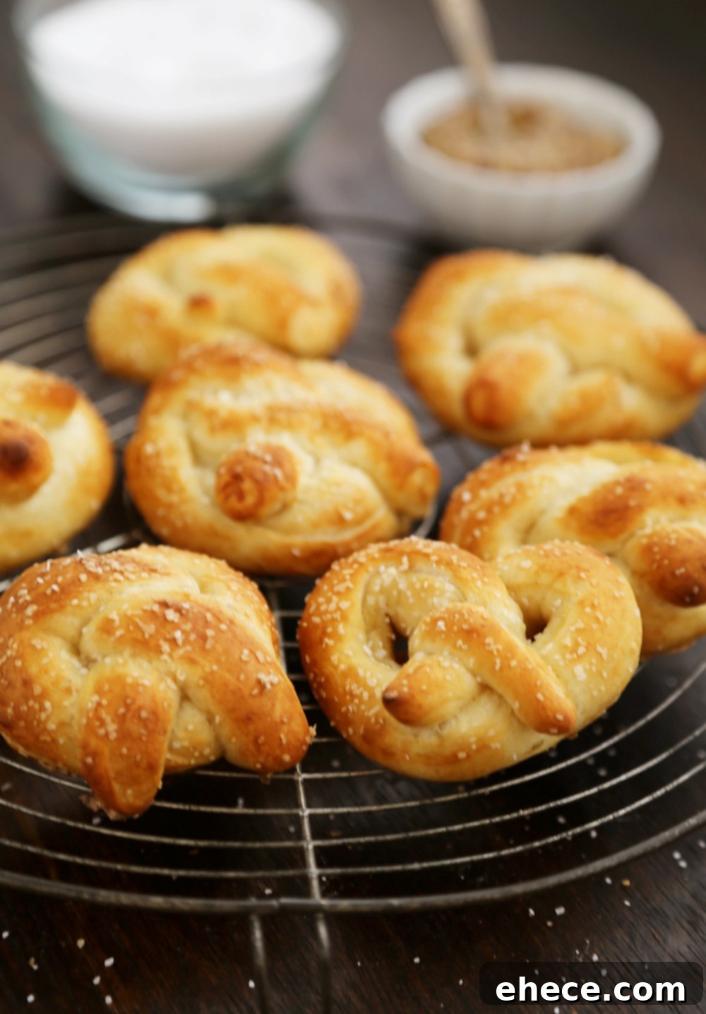 Delicious homemade mini soft pretzels with cheese sauce, a perfect party snack.