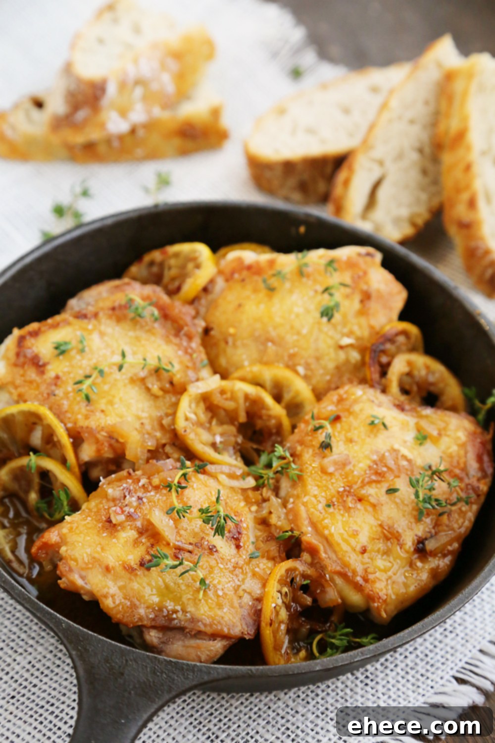 Skillet Crispy Lemon Chicken with White Wine Sauce - A perfect one-skillet dish for weeknights or elegant dinners. Serve with crusty bread.