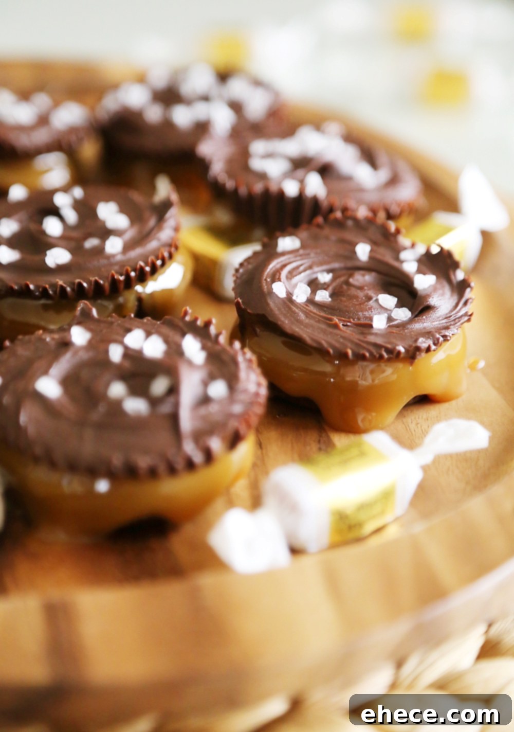 Effortless 4-Ingredient Salted Caramel Chocolate Cups 5 Ingredients for 4-Ingredient Salted Caramel Chocolate Cups laid out, featuring Werther's caramels and dark chocolate chips.