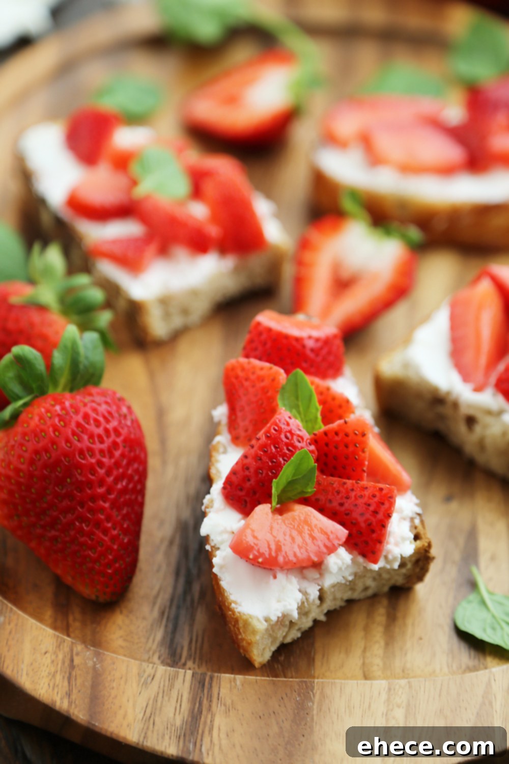 Platter of Vanilla Bean Pickled Strawberries with Goat Cheese Crostini - Elegant and easy party food for any gathering. Thecomfortofcooking.com