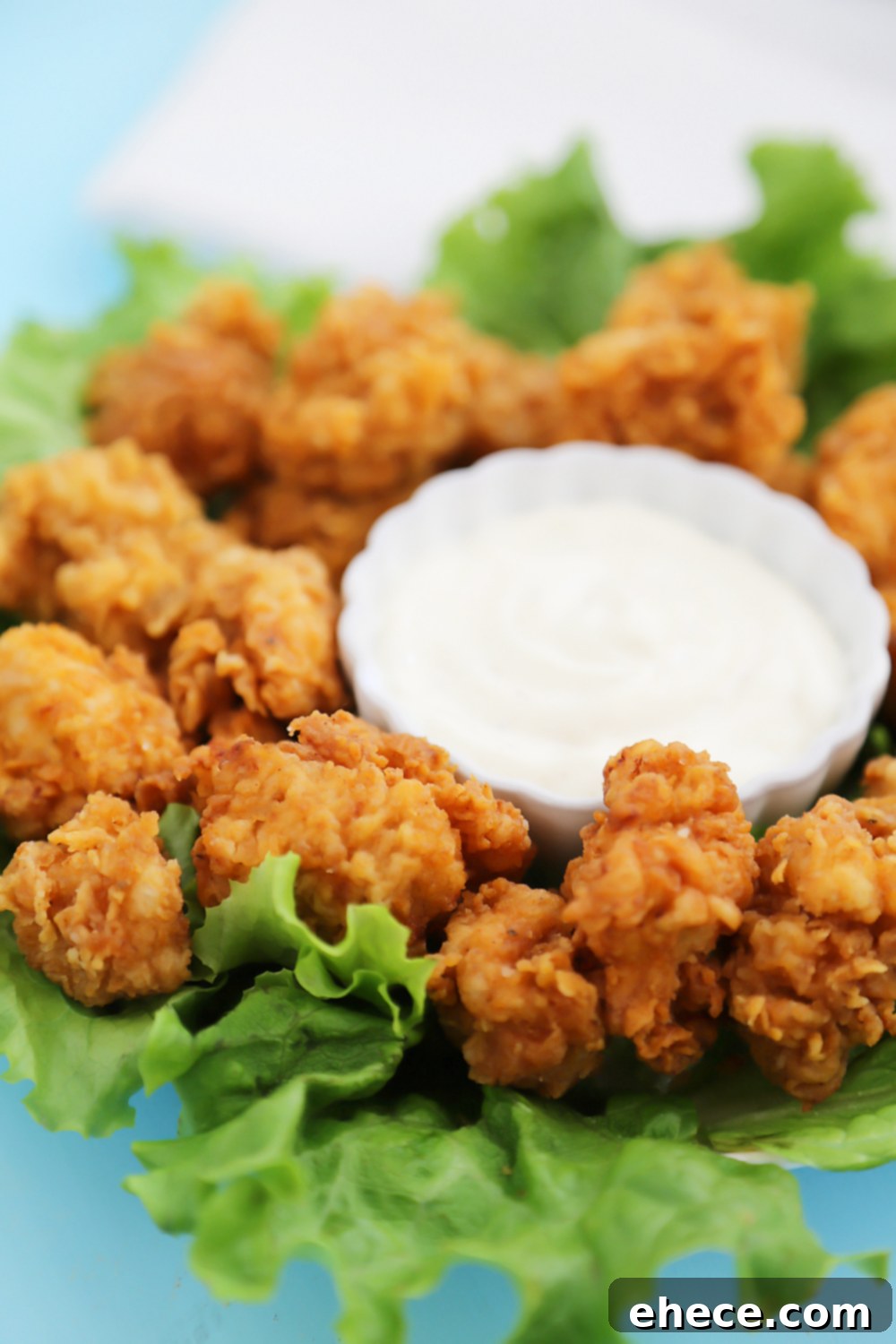 Crispy Buttermilk Popcorn Chicken - Super easy, crispy popcorn chicken made with few ingredients! Serve at parties or for weeknight meals with hot sauce, honey or Ranch dressing. Thecomfortofcooking.com