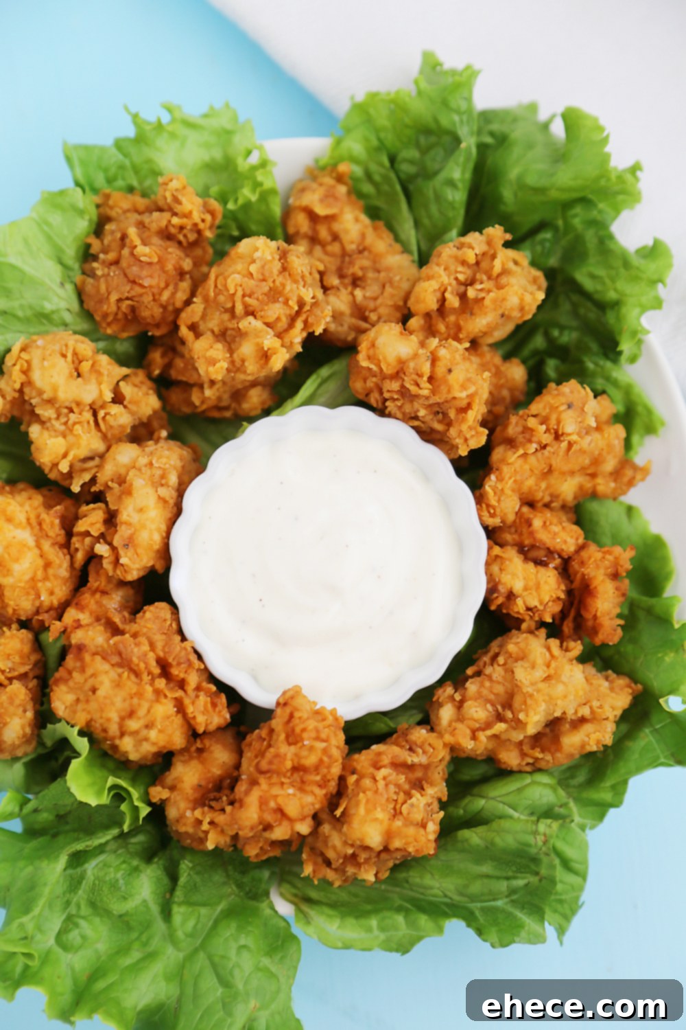 Crispy Buttermilk Popcorn Chicken - Super easy, crispy popcorn chicken made with few ingredients! Serve at parties or for weeknight meals with hot sauce, honey or Ranch dressing. Thecomfortofcooking.com