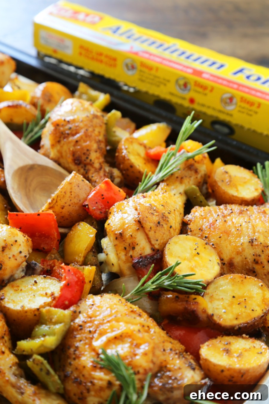 Aromatic Rosemary Chicken with Roasted Peppers & Potatoes 5 Rosemary Roasted Chicken with Bell Peppers and Potatoes - Crispy, tender roasted chicken with bell peppers, potatoes and onions makes an easy one-pan weeknight meal! TheComfortOfCooking.com