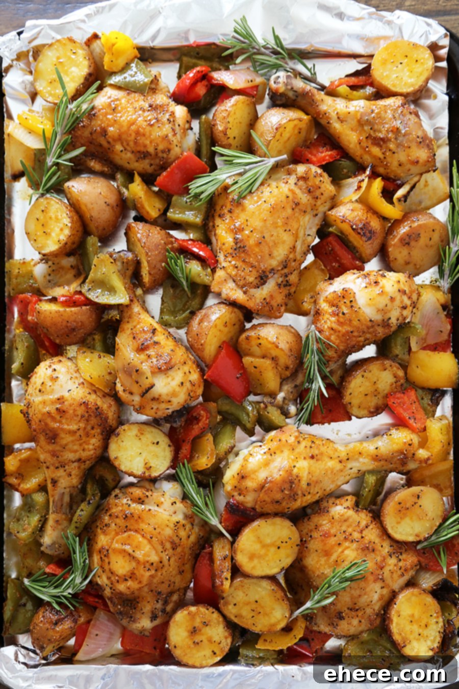 Aromatic Rosemary Chicken with Roasted Peppers & Potatoes 7 Rosemary Roasted Chicken with Bell Peppers and Potatoes - Crispy, tender roasted chicken with bell peppers, potatoes and onions makes an easy one-pan weeknight meal! TheComfortOfCooking.com