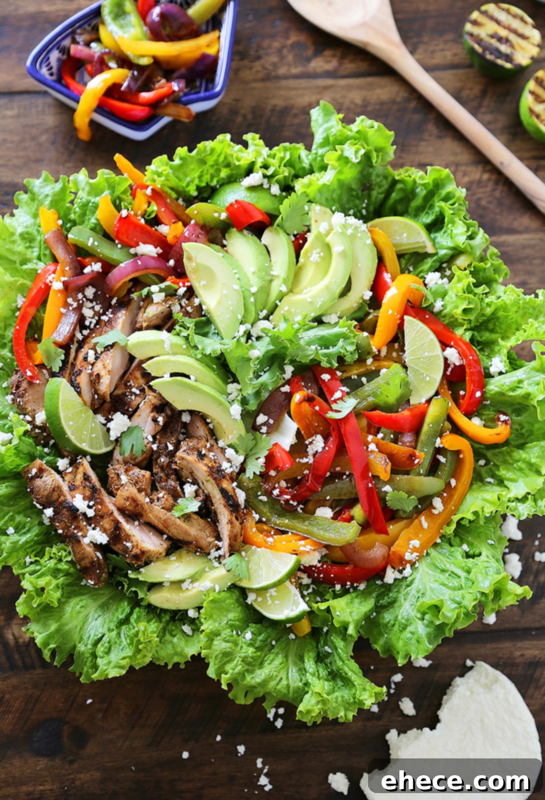 Smoky Chili-Lime Chicken Fajita Bowl 2 Grilled Chili-Lime Chicken Fajita Salad - Tender, juicy marinated chicken with fresh bell peppers, onions, garlic and avocado slices. SO good. Top with some creamy queso fresco and cilantro for extra eye appeal and flavor!