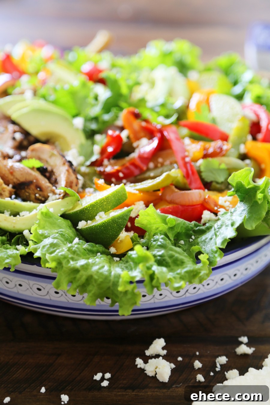 Smoky Chili-Lime Chicken Fajita Bowl 7 Grilled Chili-Lime Chicken Fajita Salad - Tender, juicy marinated chicken with fresh bell peppers, onions, garlic and avocado slices. SO good. Top with some creamy queso fresco and cilantro for extra eye appeal and flavor!