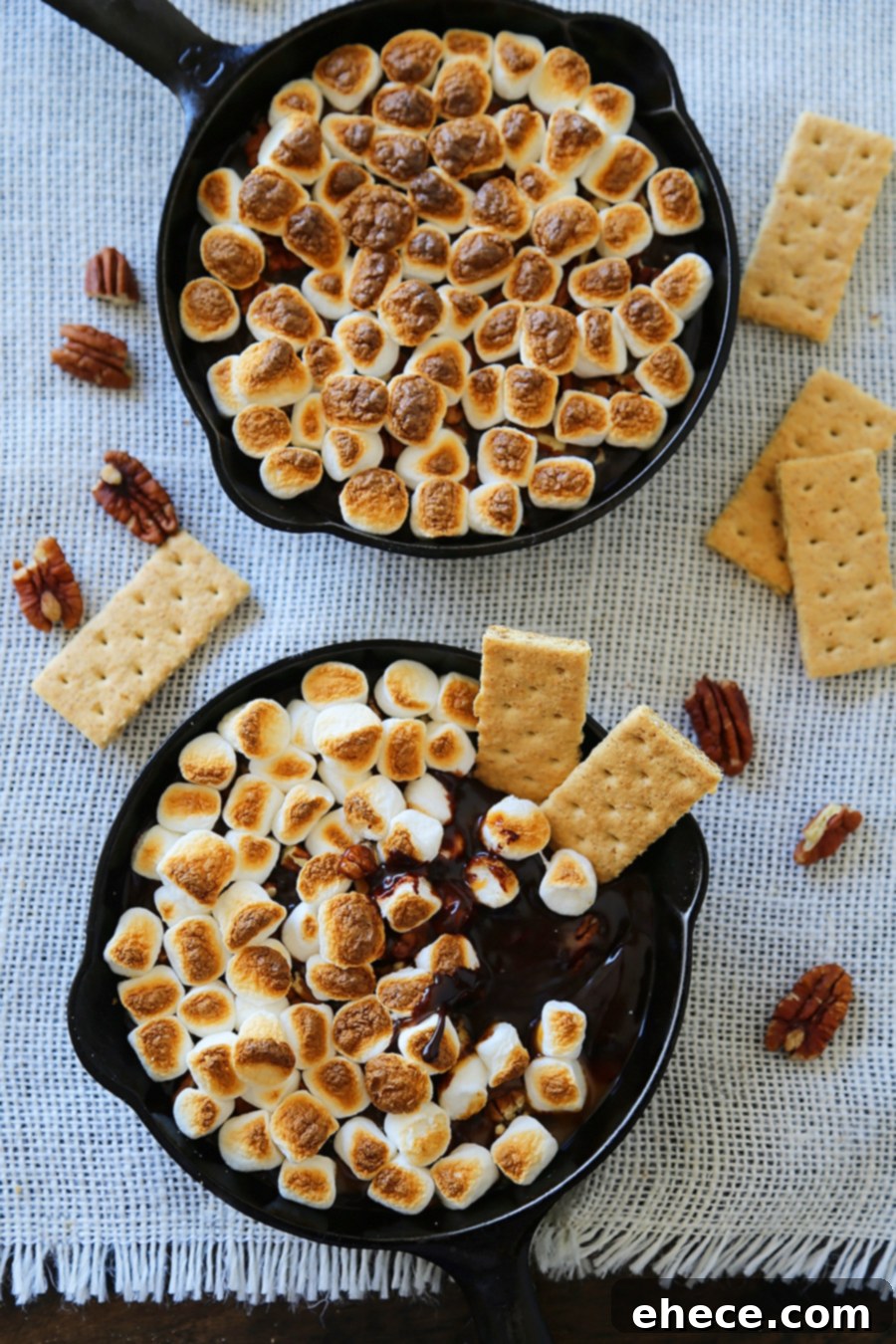 Effortless 5 Ingredient Caramel Pecan Smores Dip 6 5-Ingredient Caramel Pecan S'mores Dip - Perfect for parties! Loaded with creamy caramel and pecans, this treat is super quick and easy! thecomfortofcooking.com