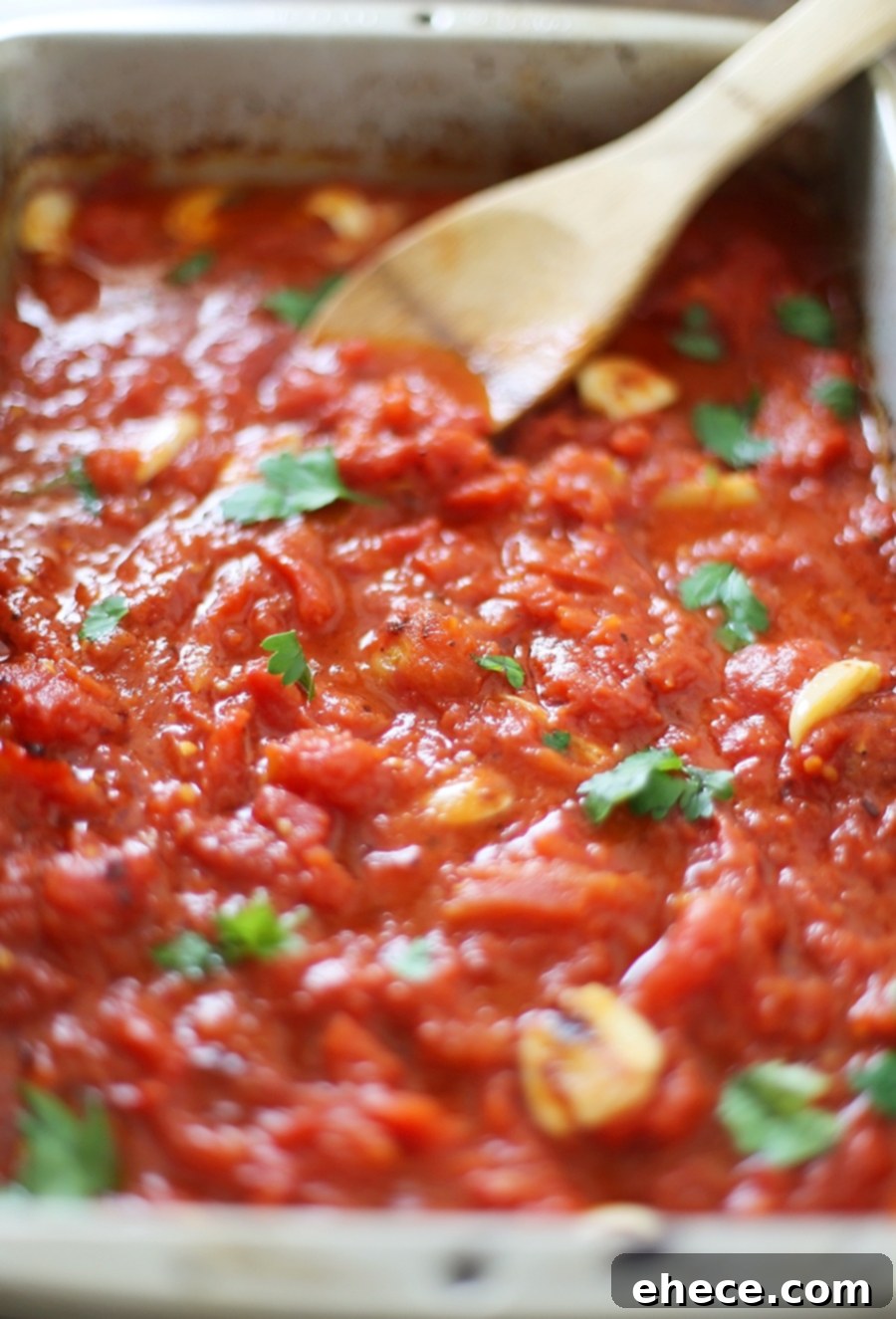 A bowl of creamy butter roasted tomato sauce and linguine, ready to be served