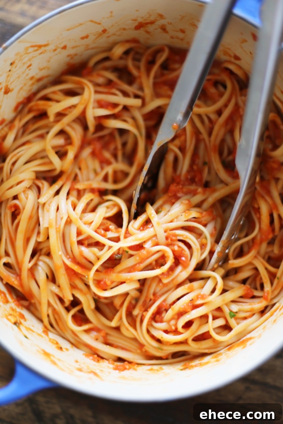 Close-up shot of roasted tomatoes, garlic, and butter mixture for pasta sauce