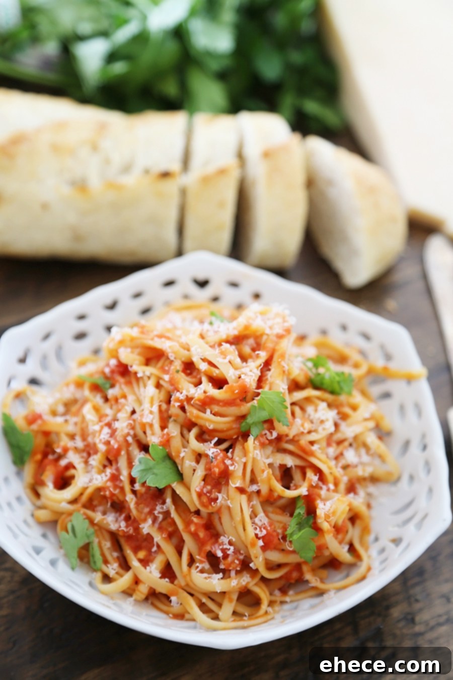 Generous serving of 5-Ingredient Butter Roasted Tomato Sauce with Linguine and Parmesan