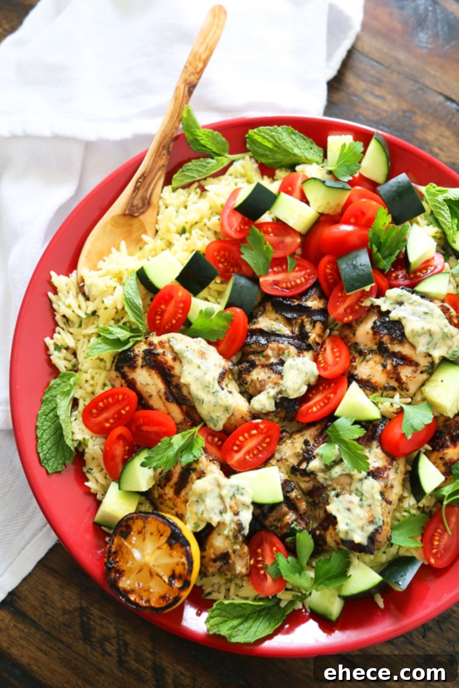 Smoky, tender marinated chicken thighs with a creamy tahini sauce, fresh veggies, orzo and a squeeze of lemon! Full of nutritious, hearty goodness!