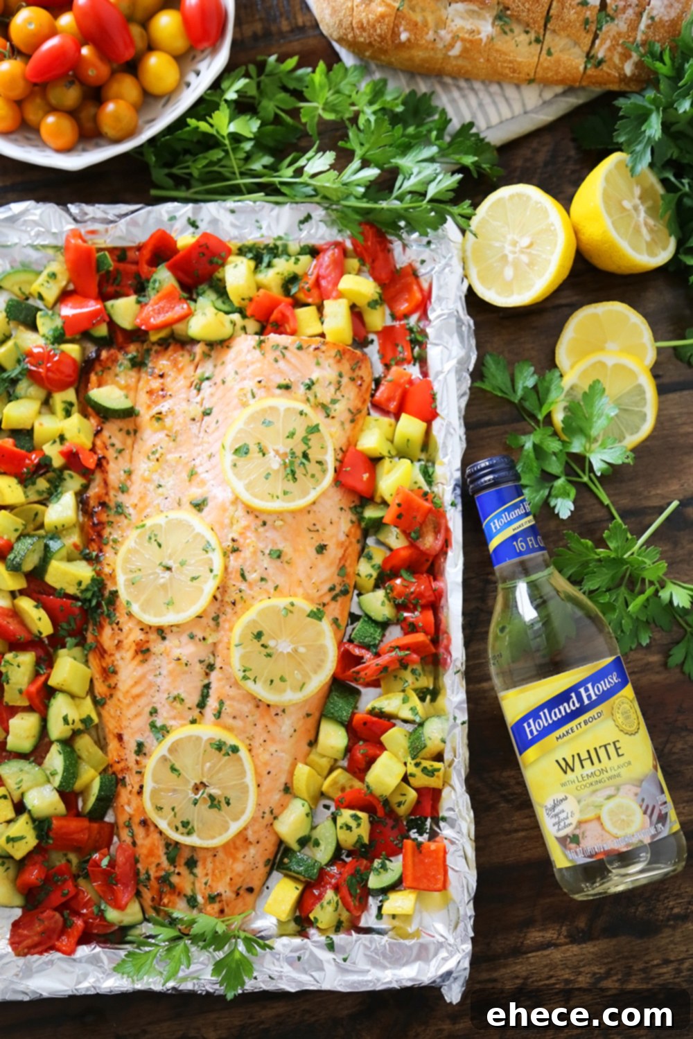 Lemon Garlic Honey Butter Salmon Veggie Foil Packs 4 Lemon-Garlic Honey Butter Salmon & Veggies in Foil - Juicy, flaky roasted salmon with lemon-garlic honey butter and tender summer veggies! One pan full of hearty, healthy goodness! thecomfortofcooking.com
