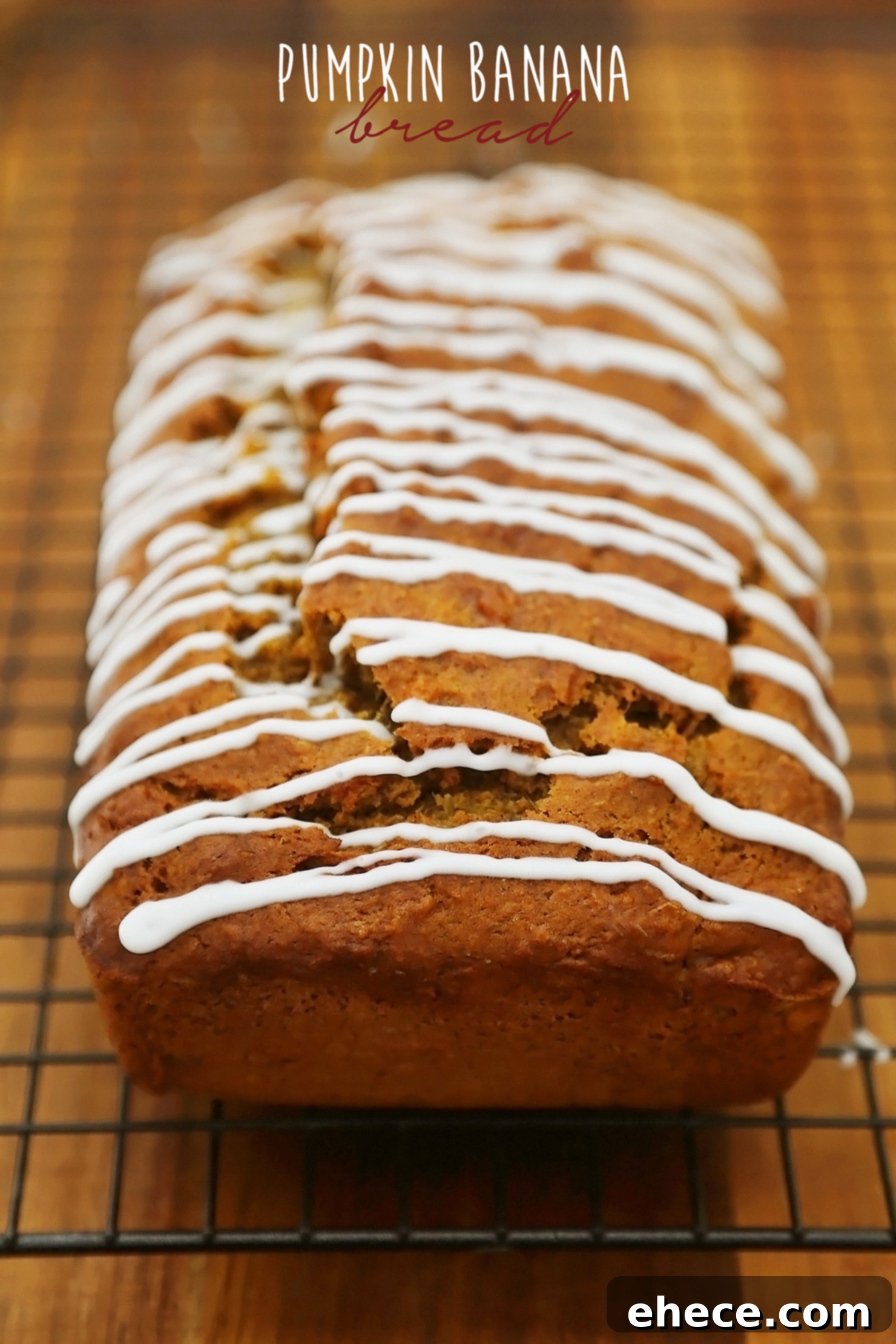Autumn Pumpkin Banana Bread with Vanilla Drizzle 4 Close-up of fluffy Pumpkin Banana Bread with a generous drizzle of sweet vanilla glaze, perfect for a cozy fall treat.