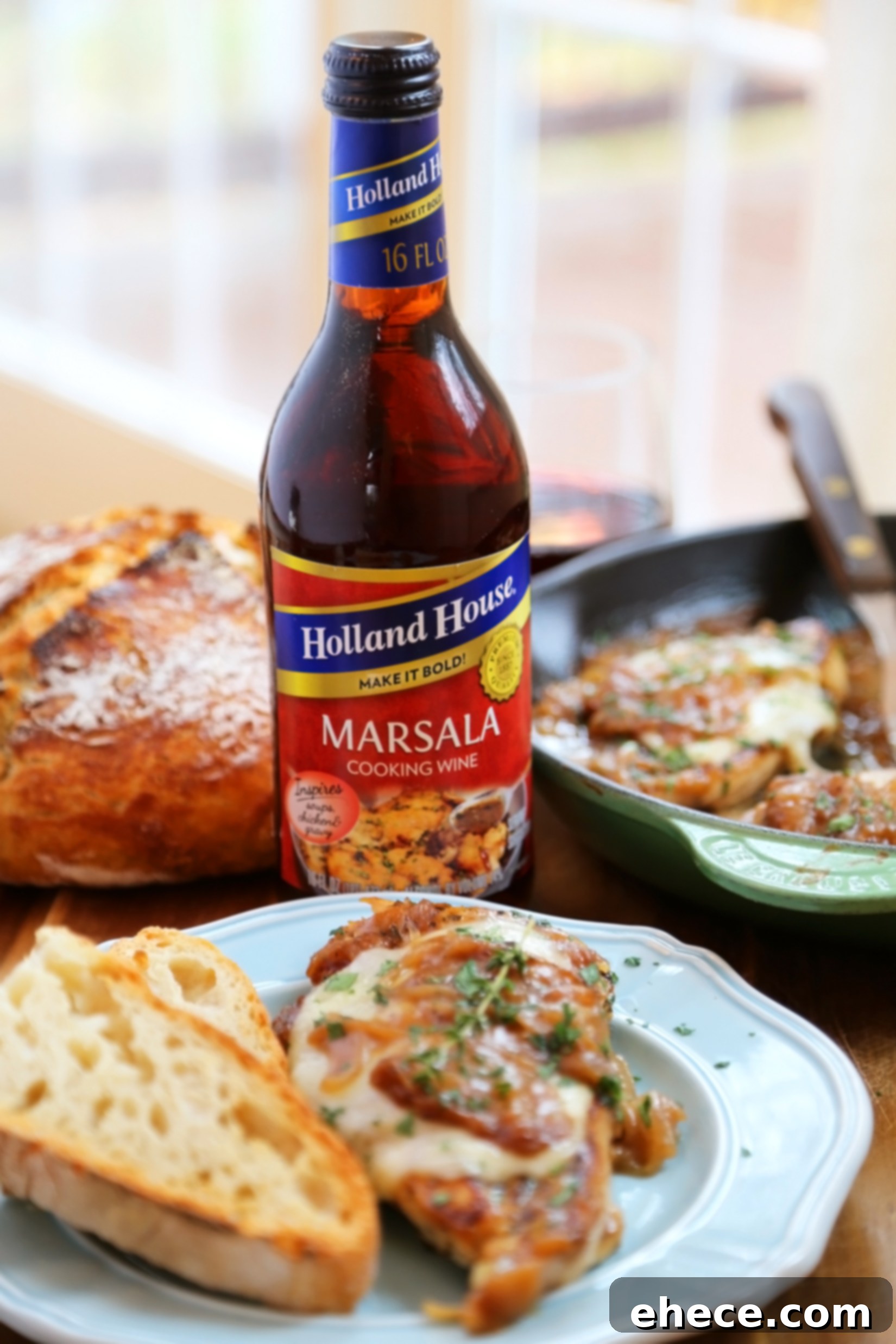 Skillet French Onion Chicken - Saucy, melt-in-your-mouth French onion chicken smothered in caramelized onion gravy, topped with melted cheese.