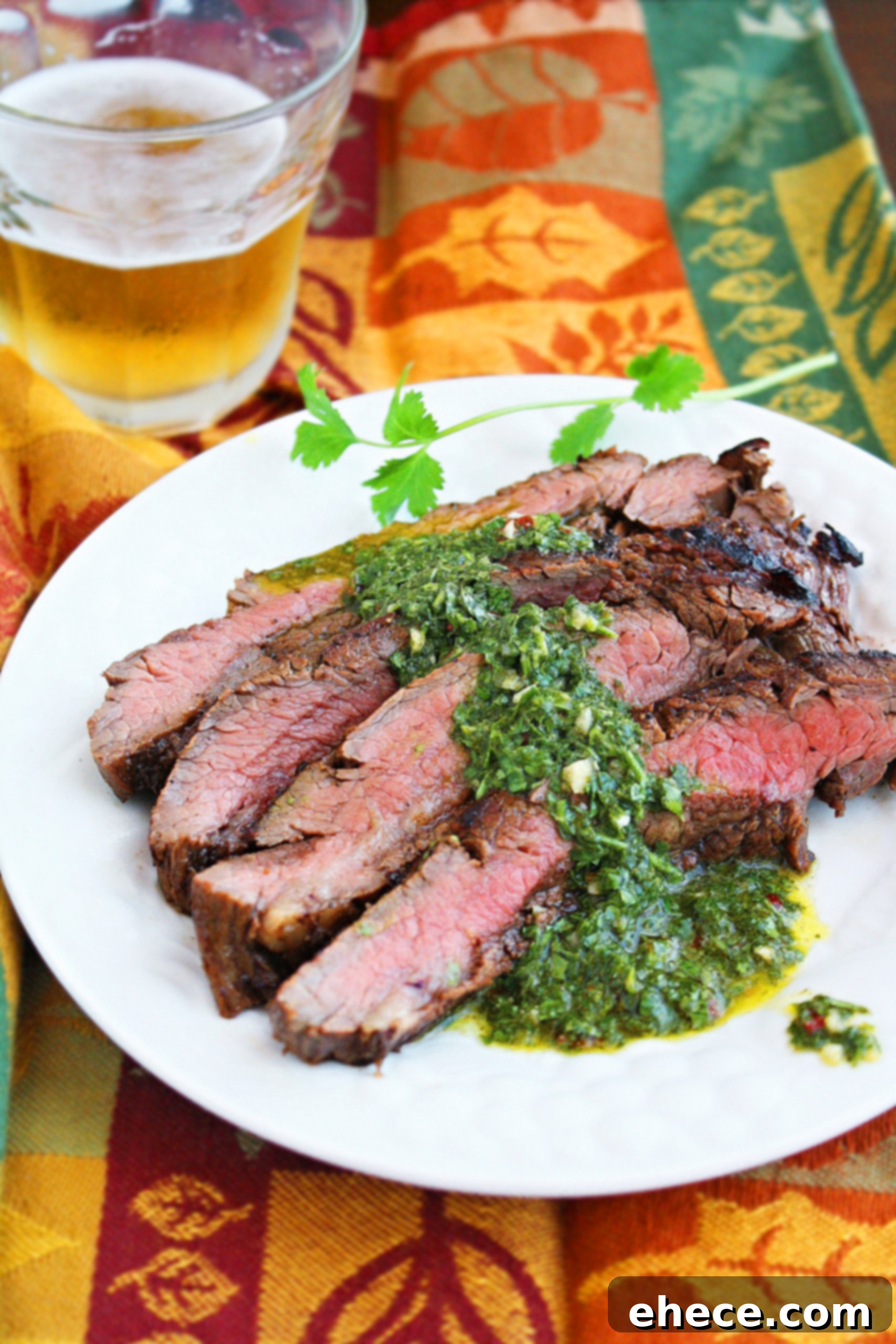 Grilled Flank Steak with Chimichurri Zing 2 Perfectly grilled marinated flank steak sliced and ready to serve