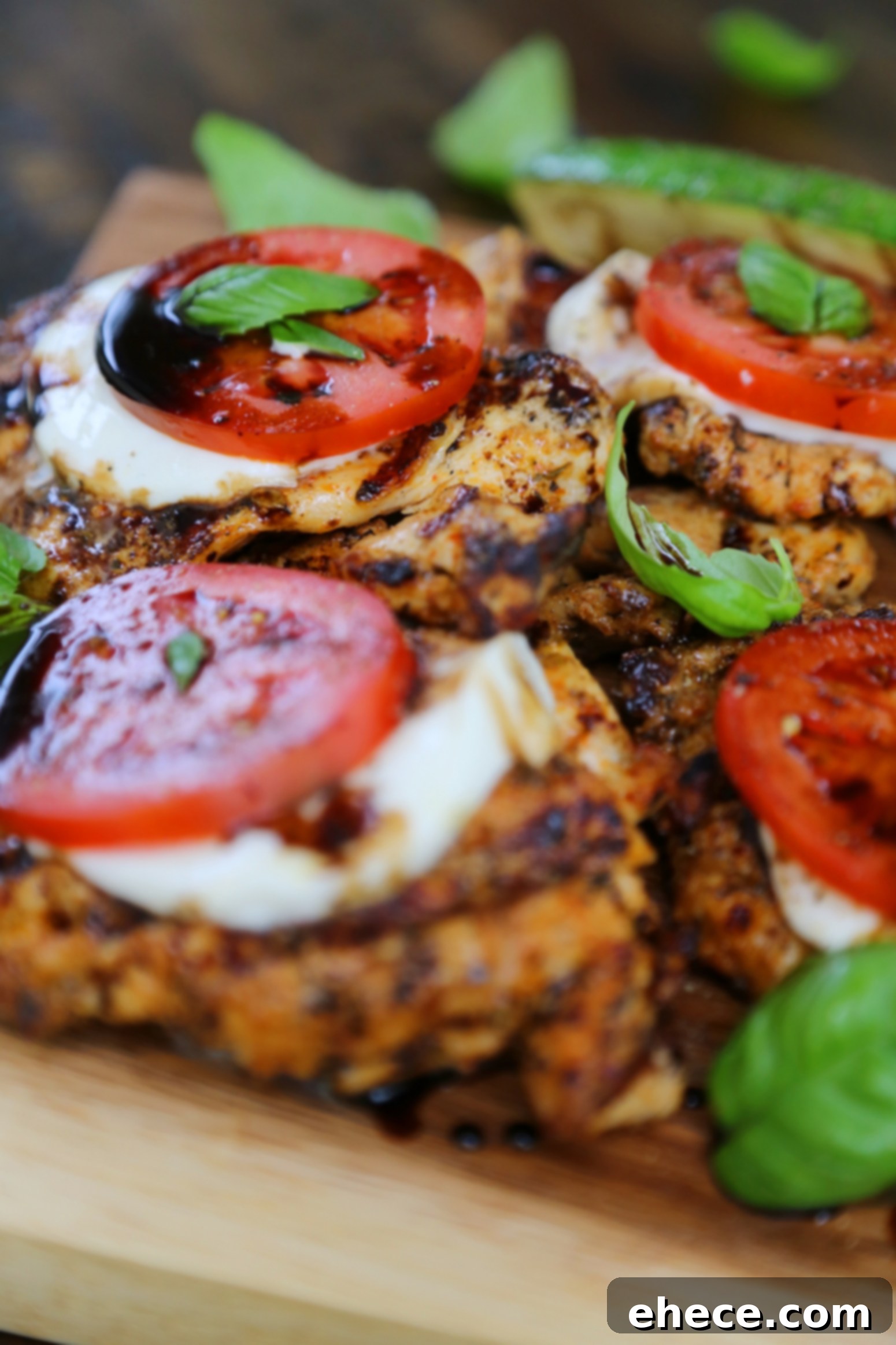 Vibrant Caprese Chicken with Grilled Summer Squash 6 Close up view of the finished Caprese chicken dish on a pristine white plate