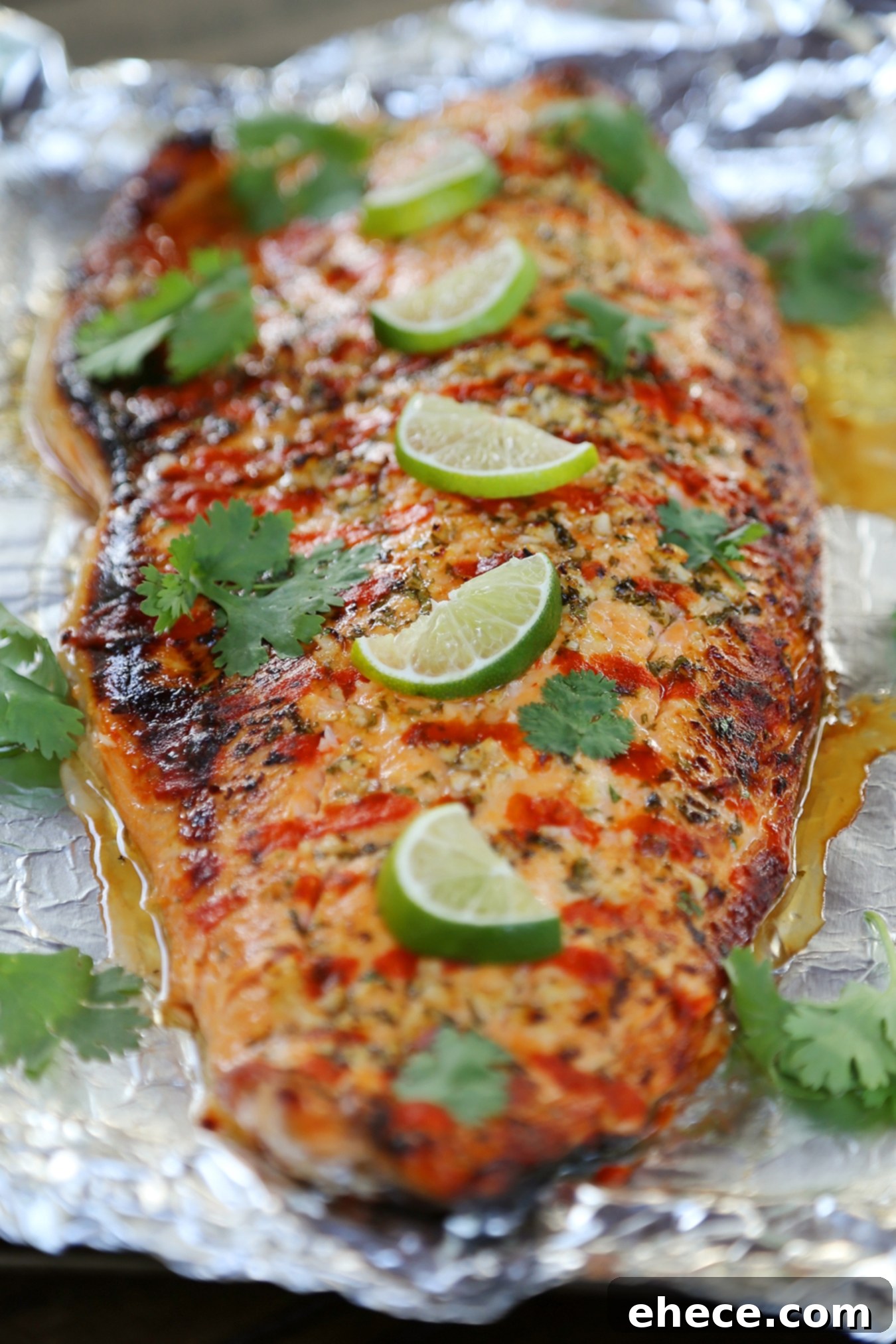 Honey Cilantro Lime Salmon Packets 4 Honey Cilantro Lime Salmon in Foil - Buttery, flaky salmon fillet that melts in your mouth. So quick & easy! thecomfortofcooking.com
