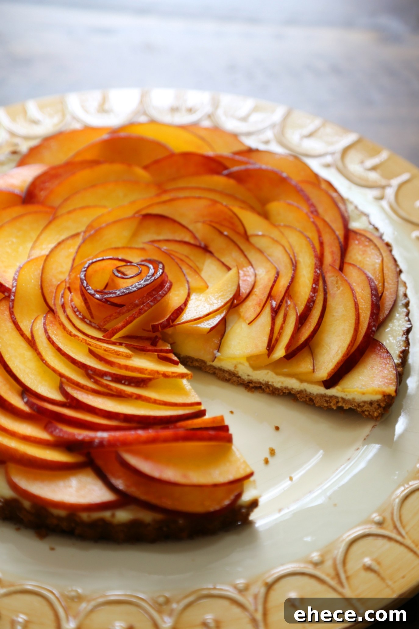 A perfectly portioned slice of Creamy Peach and Honey Tart on a white plate, garnished with fresh mint.