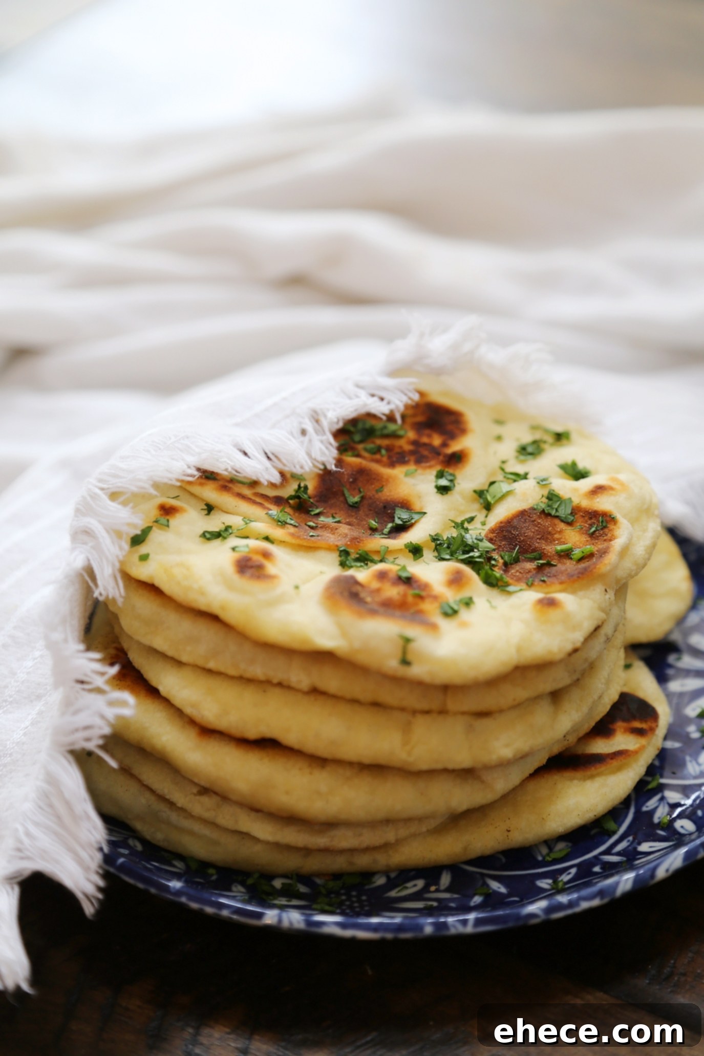 Pillowy Soft Homemade Naan 2 Homemade Naan (Soft Flatbread) - Soft, buttery and EASY flatbread made with only pantry ingredients! thecomfortofcooking.com