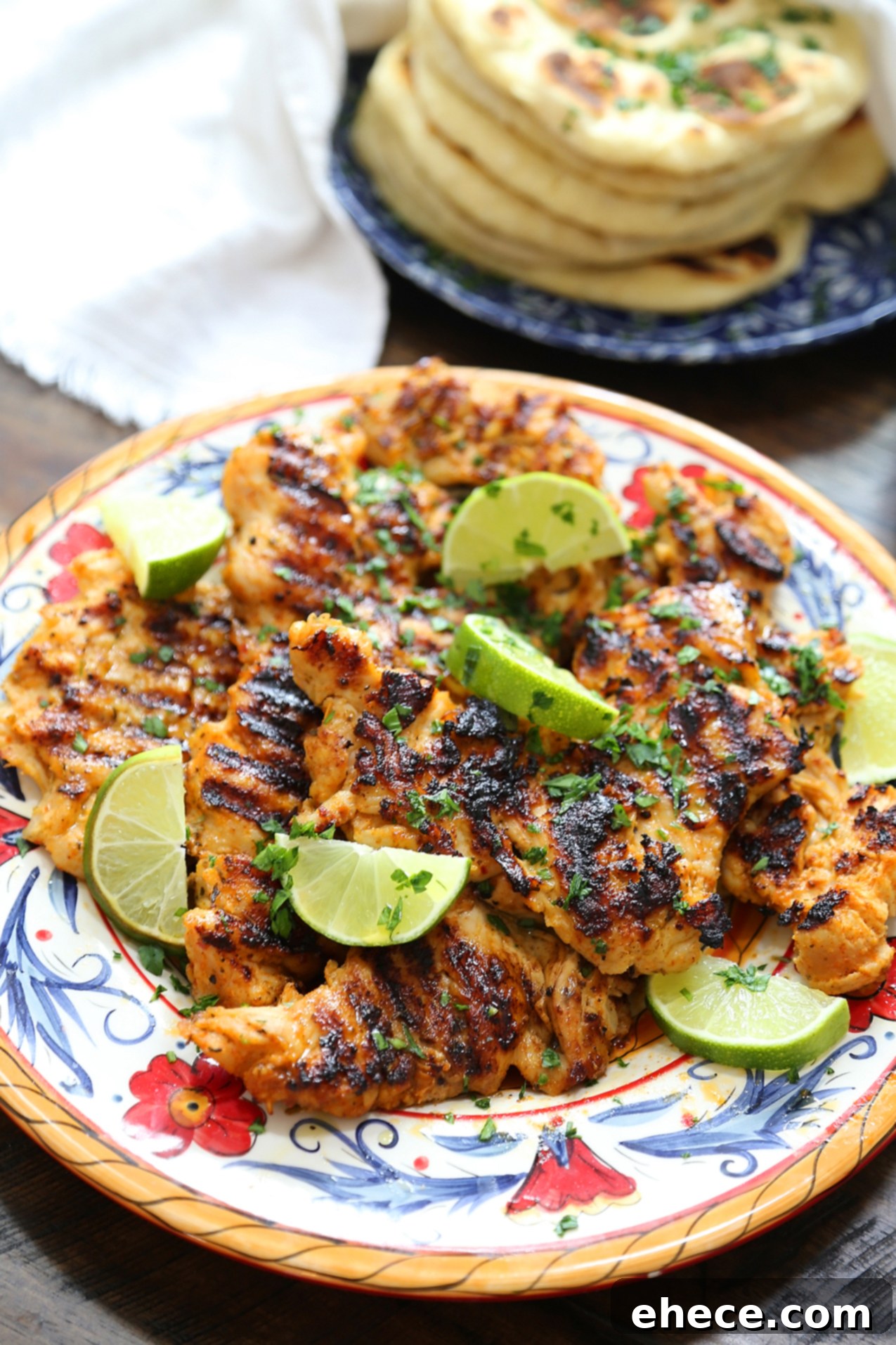 Sizzling Chili Lime Chicken with Refreshing Cucumber Mint 3 Close-up of perfectly grilled Chili-Lime Chicken, showcasing its delicious char and vibrant seasoning.