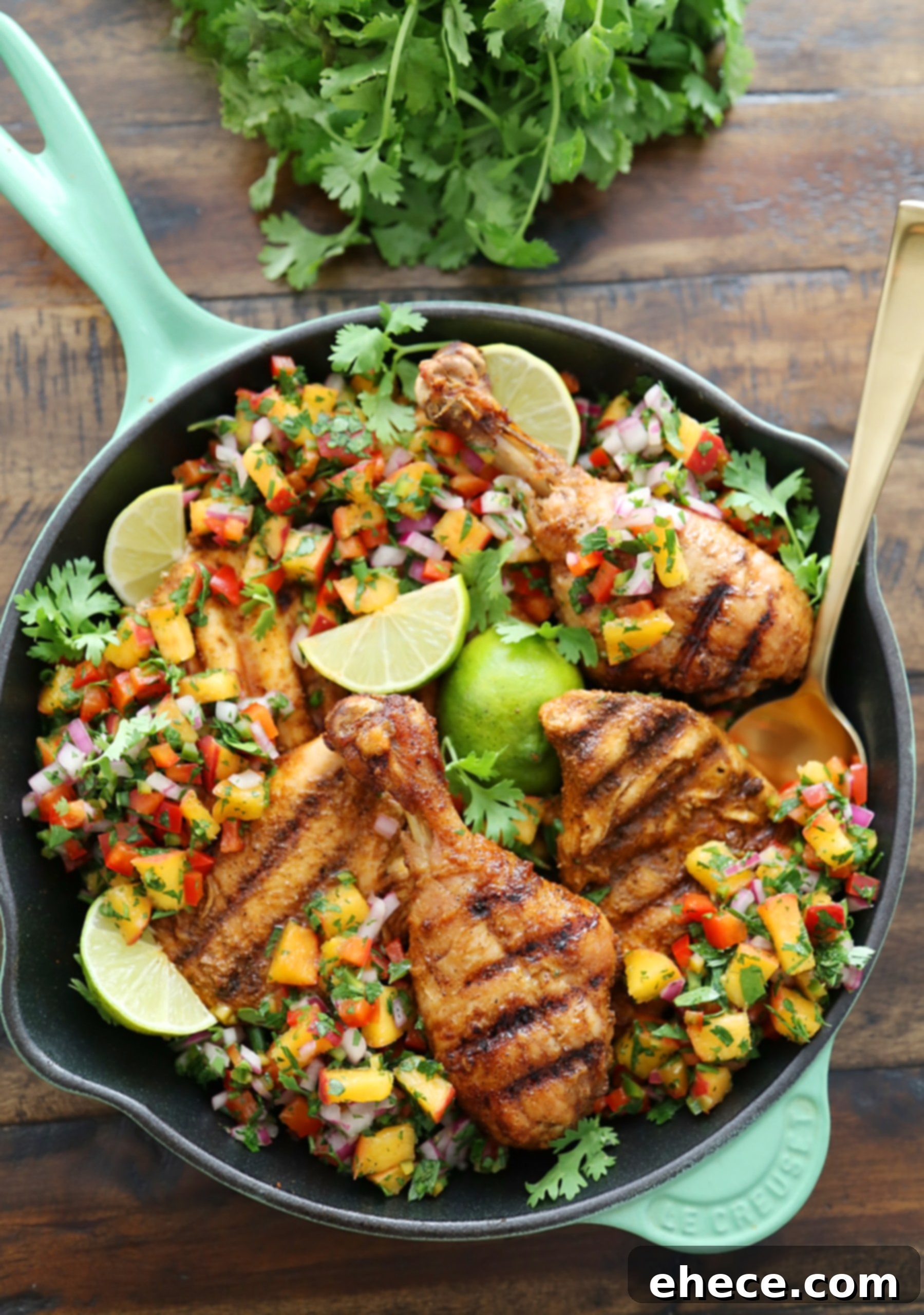 Sweet Heat Grilled Chicken with Peach Salsa 5 Ingredients for peach salsa laid out on a cutting board: fresh peaches, red onion, jalapeño, cilantro.