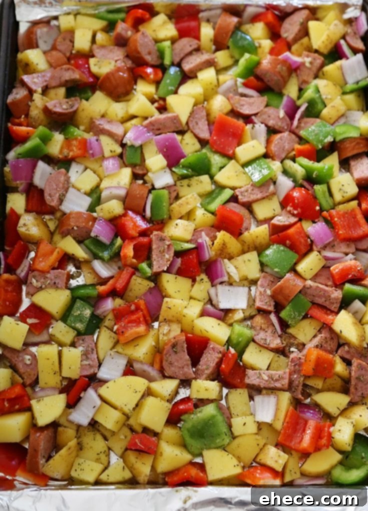 One-Pan Roasted Sausage, Peppers and Potatoes recipe card image for Pinterest.