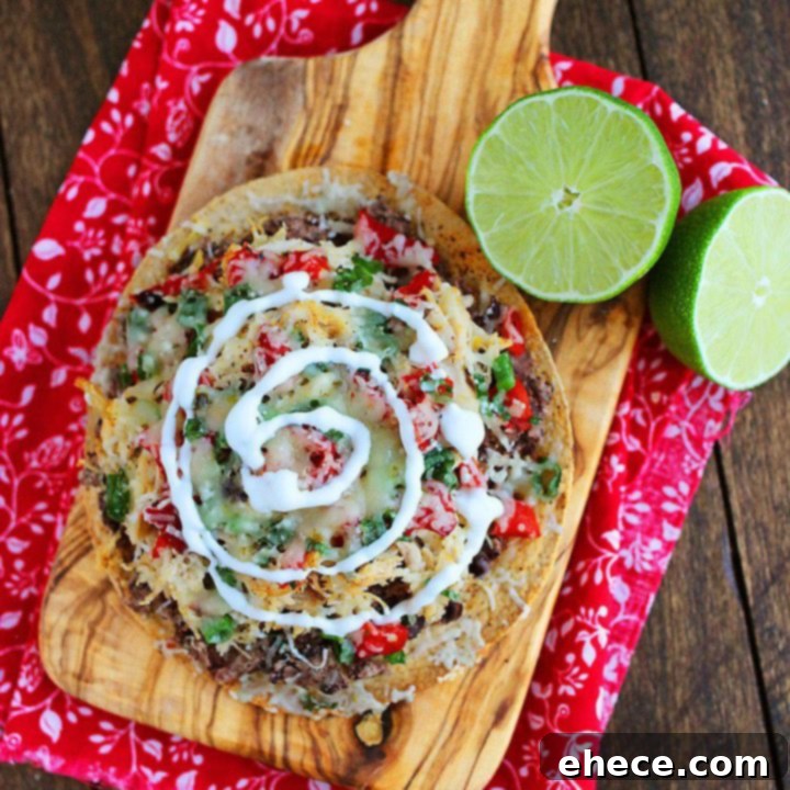Crispy Baked Mexican Tostadas with Chicken, Black Beans, and Pepper Jack Cheese