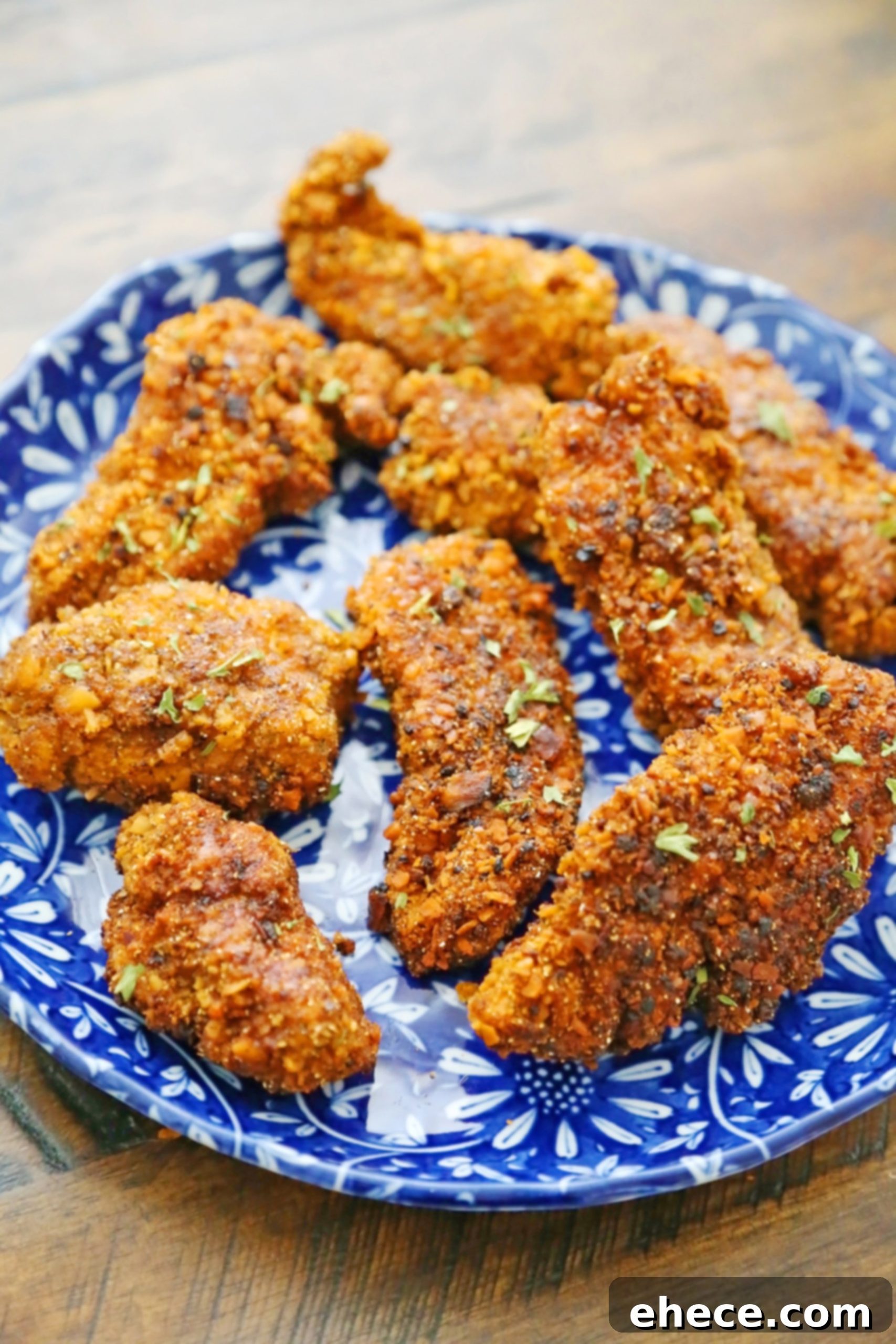 Three perfectly baked Cheddar Ranch Chicken Tenders ready to be served