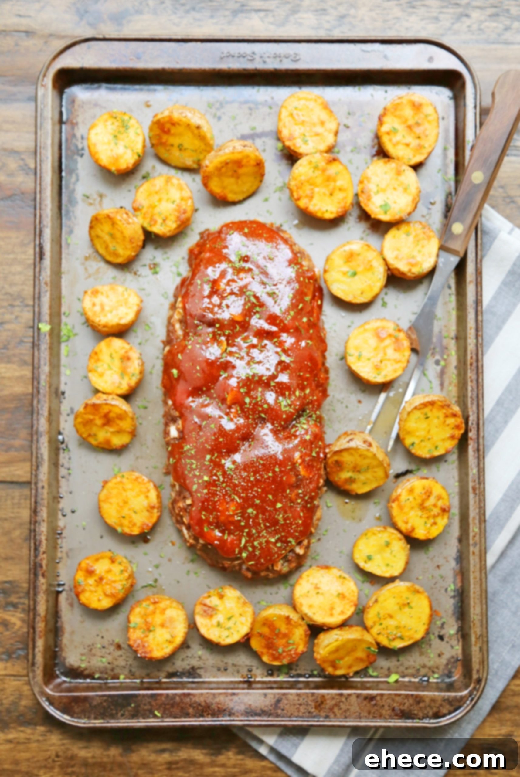 Glazed meatloaf and crispy potatoes after cooking
