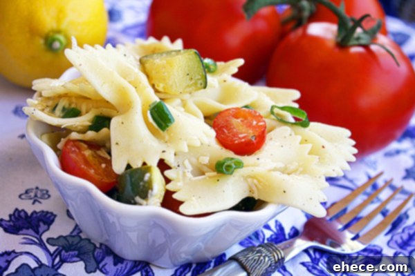 Mediterranean Zucchini and Tomato Pasta Salad with Parmesan 2 Vibrant Pasta Salad with Tomatoes, Zucchini, and Parmesan