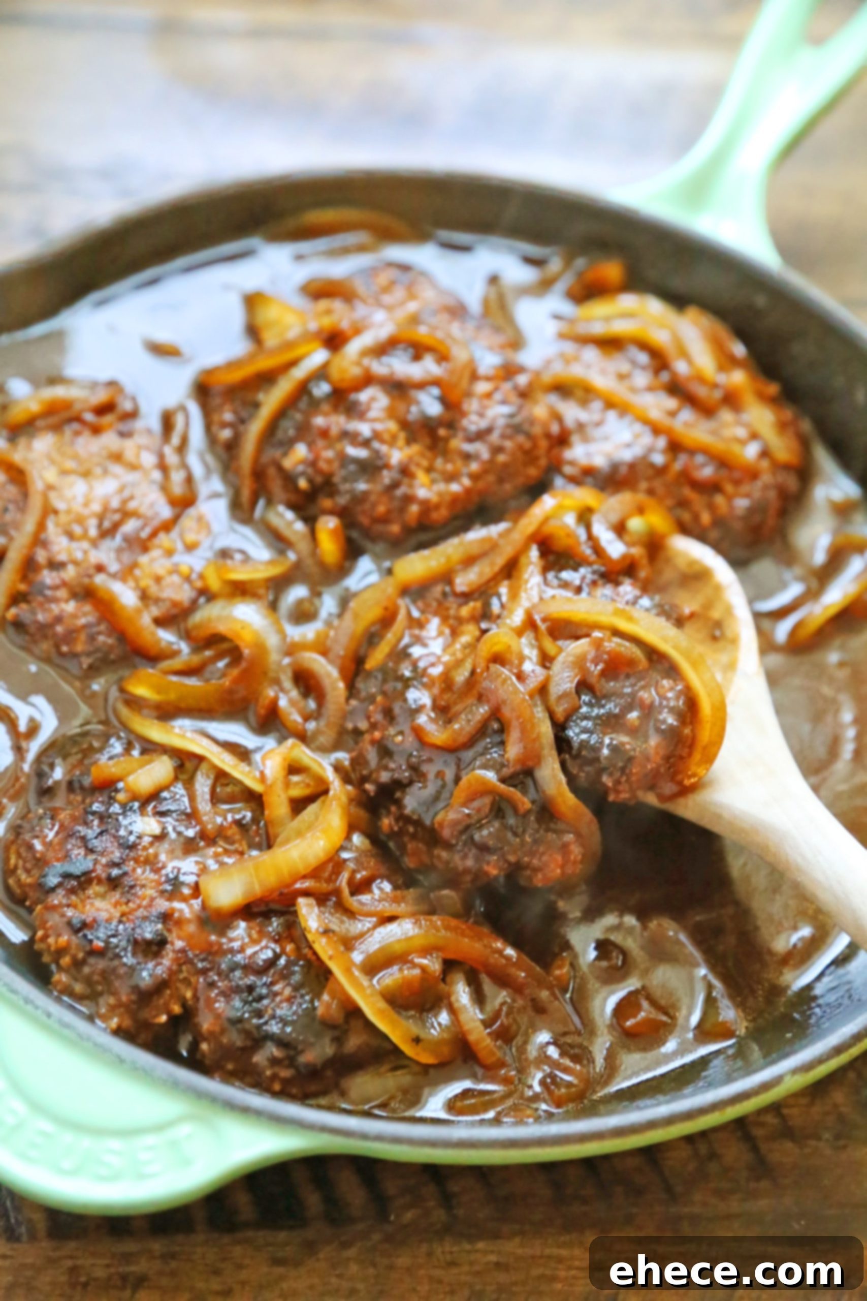 Skillet Salisbury Steak served over mashed potatoes with gravy