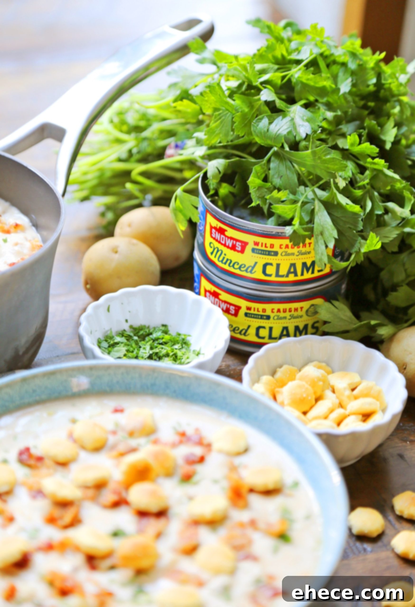 Close-up of creamy clam chowder in a rustic bowl