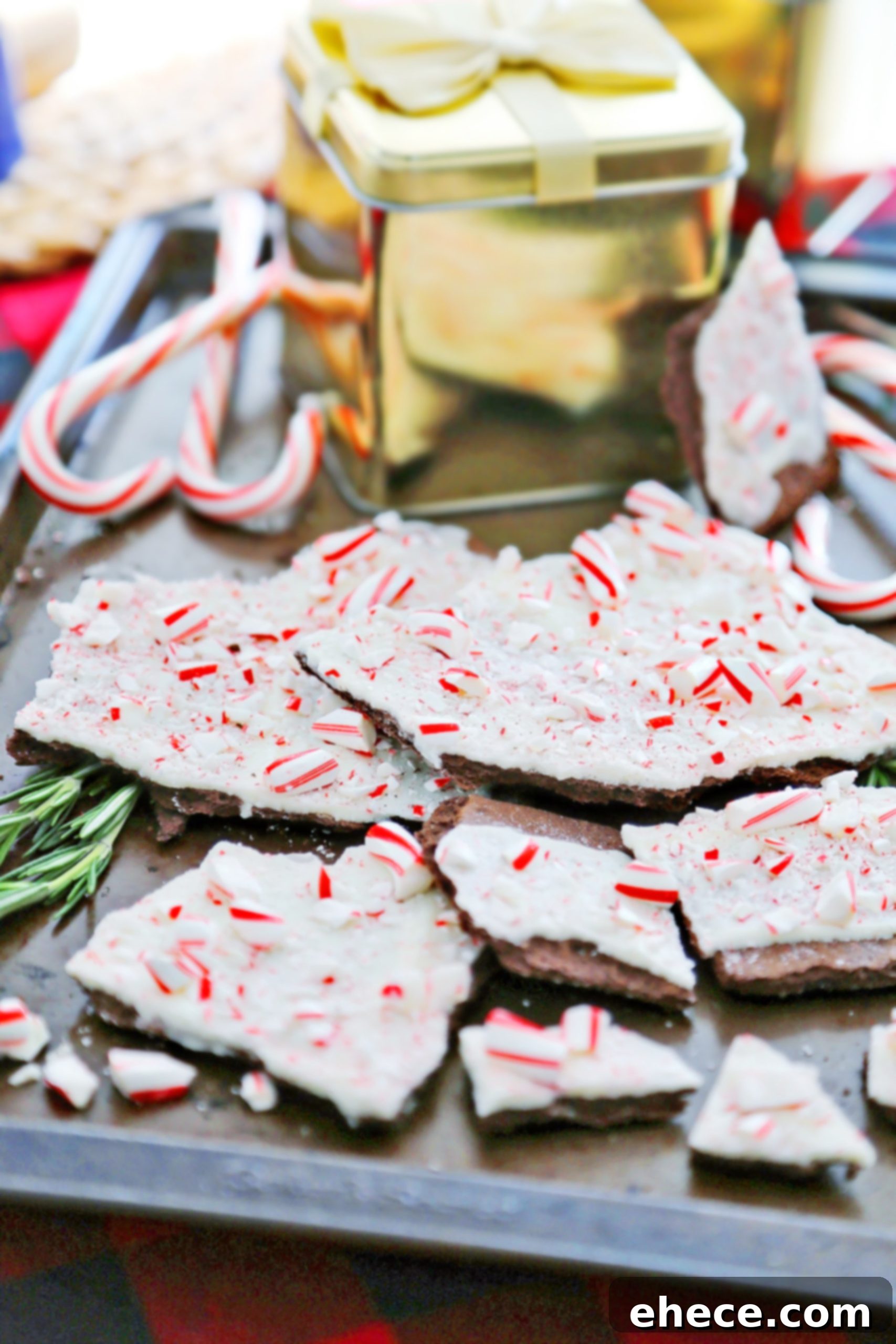 Various pieces of Peppermint Graham Cracker Bark on a white plate