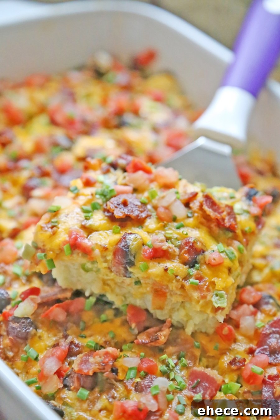 Served Bacon Egg and Tater Tot Casserole with toppings