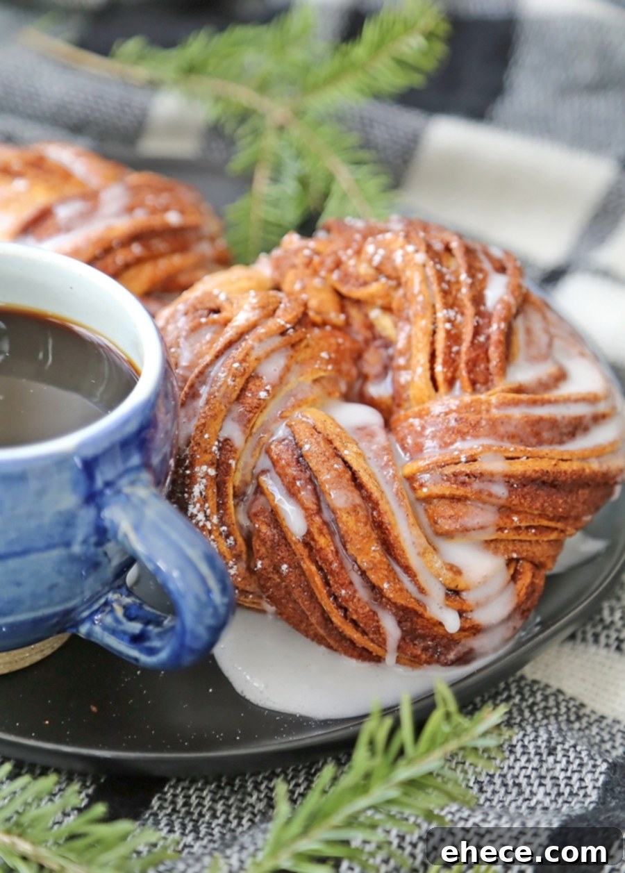 Four-Ingredient Cinnamon Swirl Wreath 2 Beautifully baked cinnamon twist wreath, golden brown and glistening with glaze.