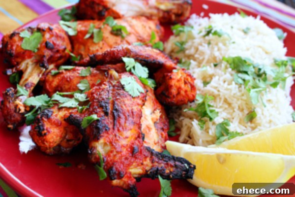 Delicious Tandoori Chicken with Basmati Rice on a serving platter