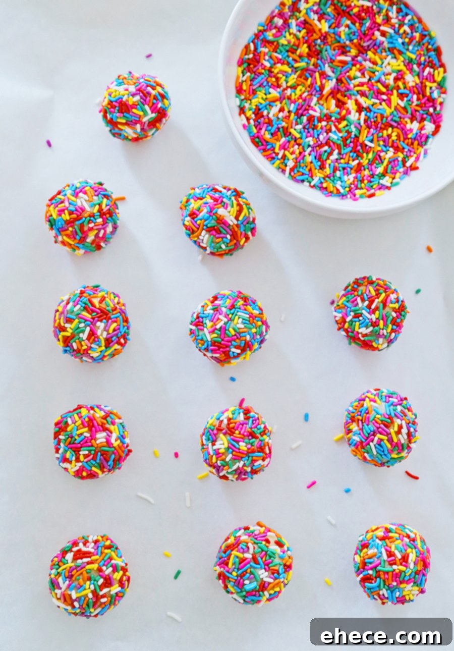 Several Rainbow Sprinkle Cookies arranged on a plate