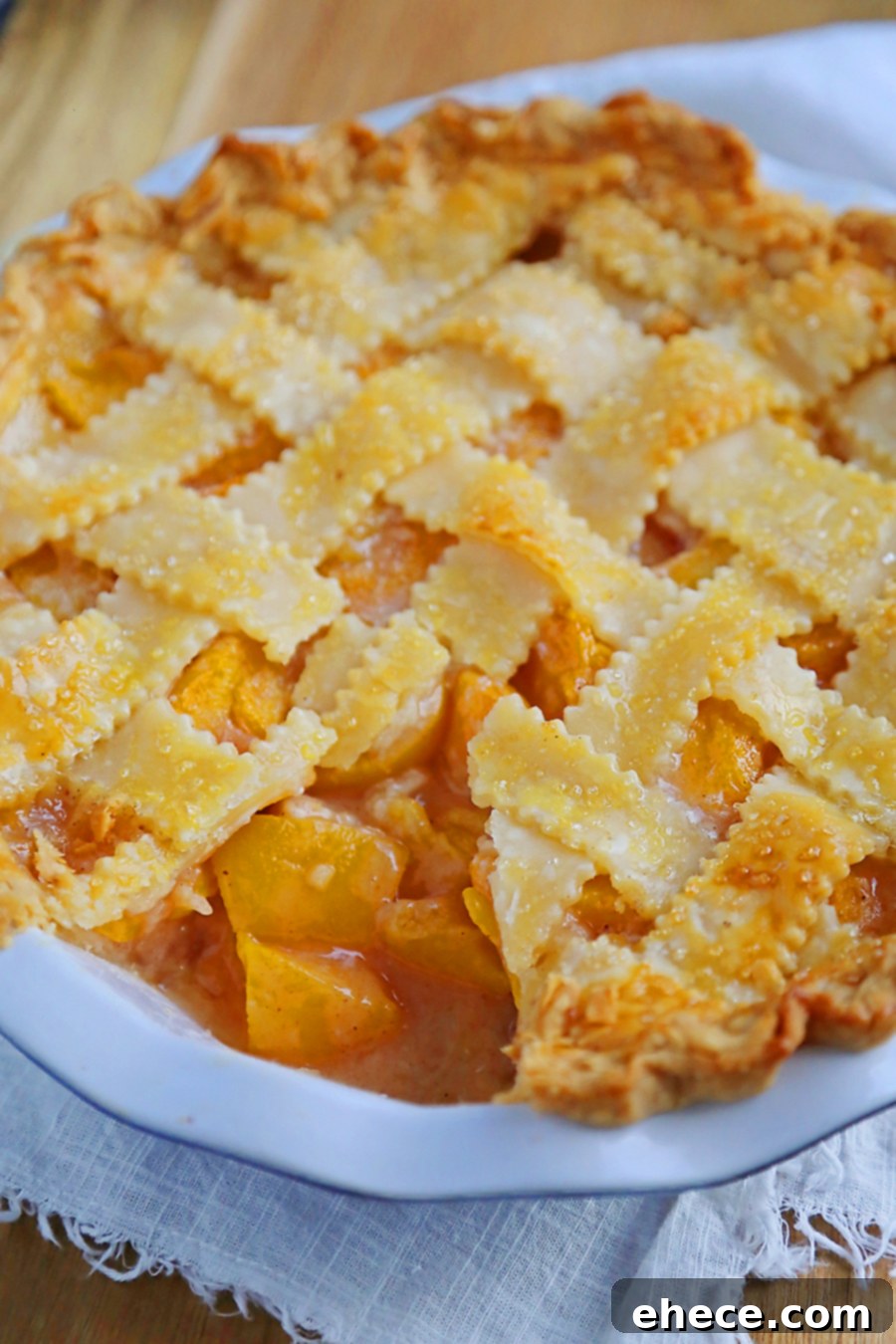 Overhead view of a whole peach pie