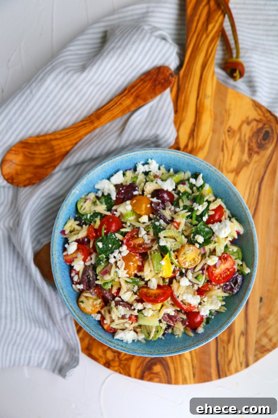 Mediterranean Sunshine Orzo Salad 3 Close-up of Mediterranean Orzo Salad with a fork taking a scoop