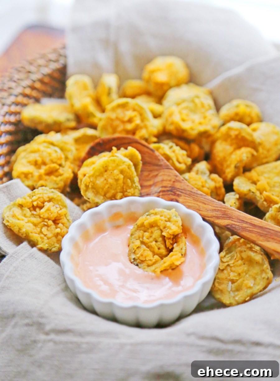 Close-up of crispy fried pickles being served