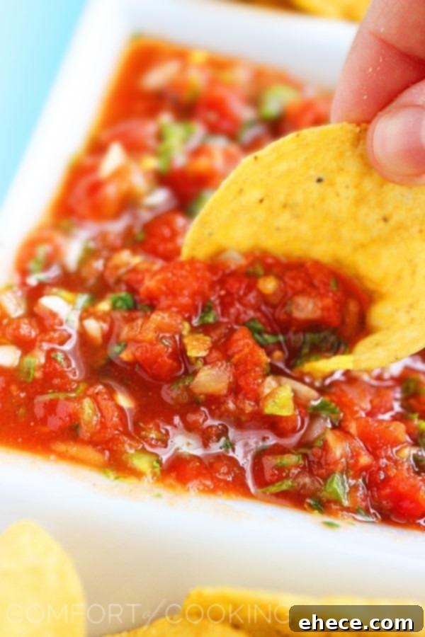 Ingredients for Easy Restaurant Style Salsa on a cutting board