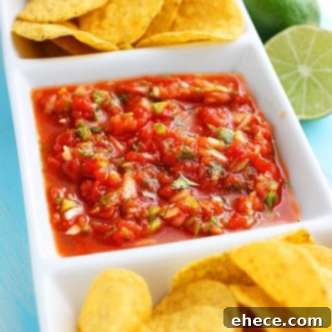 Bowl of Restaurant Style Salsa garnished with cilantro