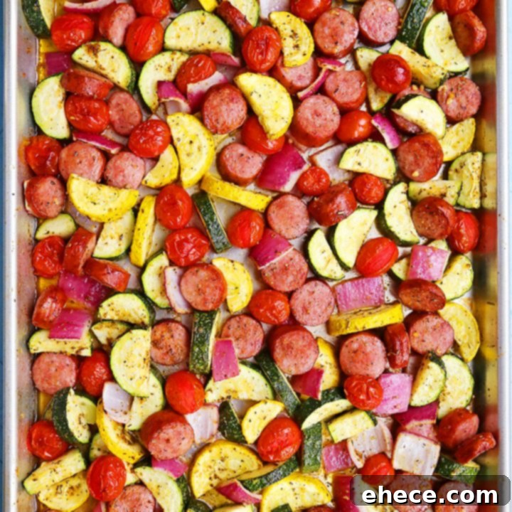 Easy One-Pan Sausage, Zucchini, and Tomato Dinner 7 Sausage, Zucchini + Tomato Sheet Pan Dinner