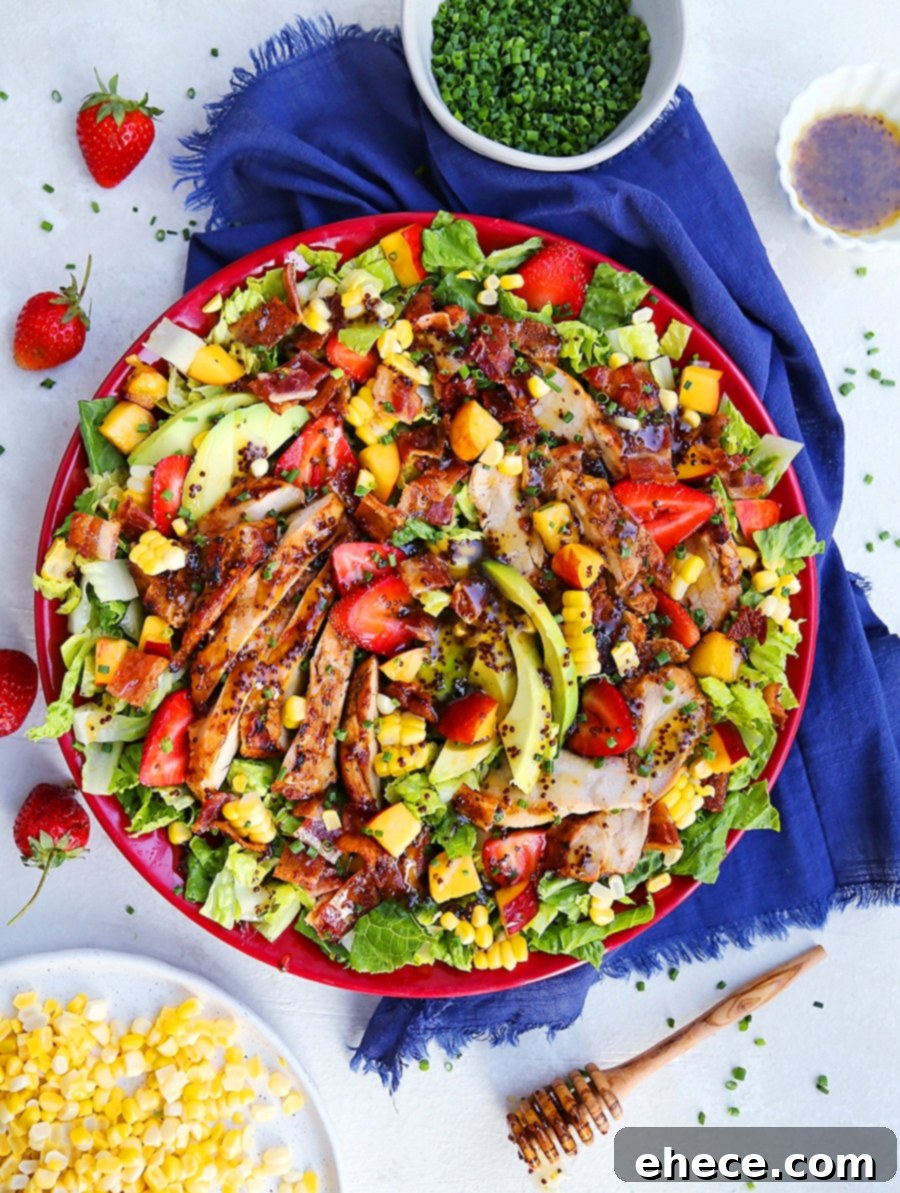Delicious Honey Mustard Chicken Salad with grilled chicken, bacon, strawberries, and corn
