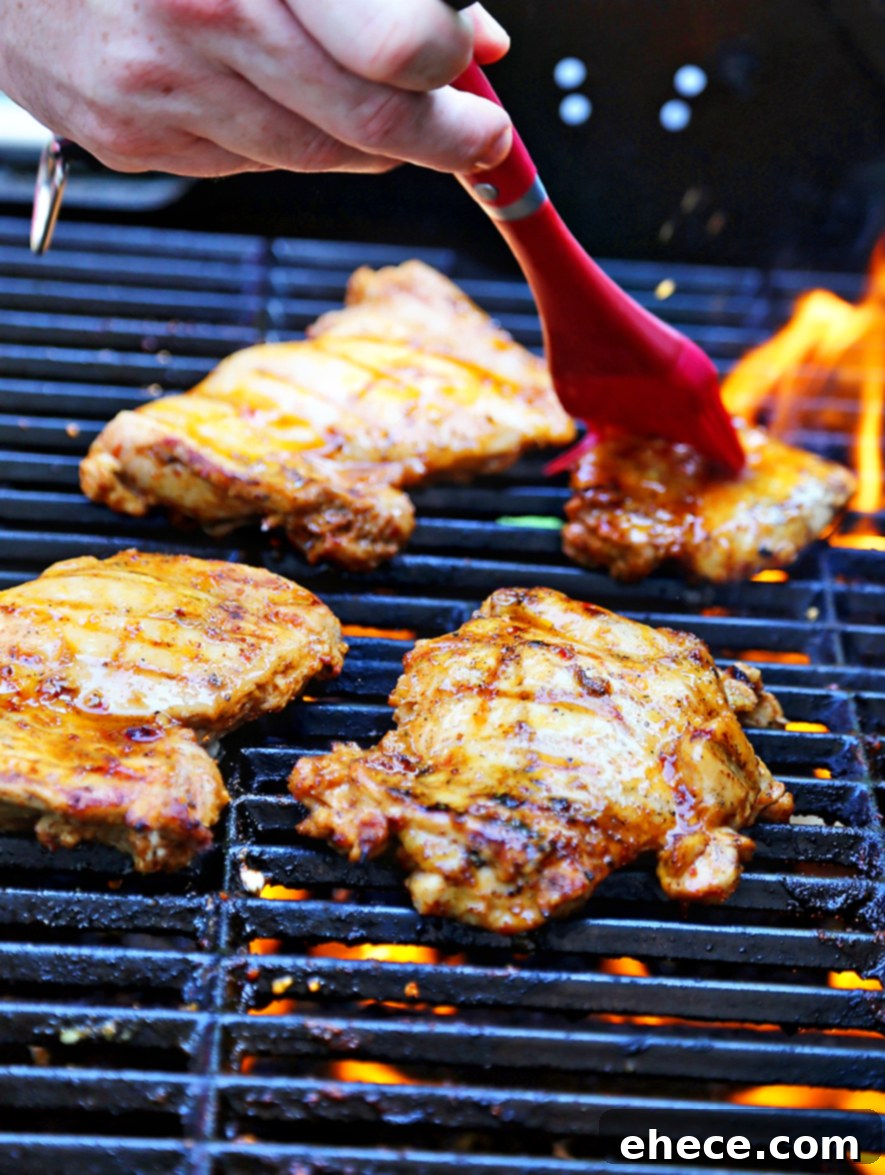 A close-up of a vibrant Honey Mustard Chicken Salad, highlighting grilled chicken and fresh produce