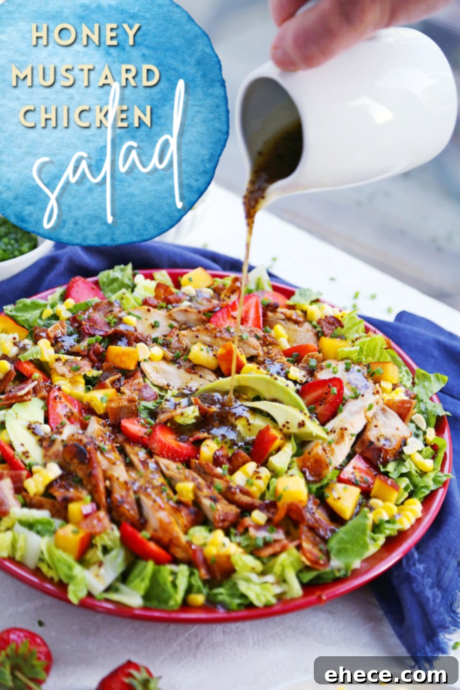 Overhead view of a prepared Honey Mustard Chicken Salad in a bowl, ready to serve